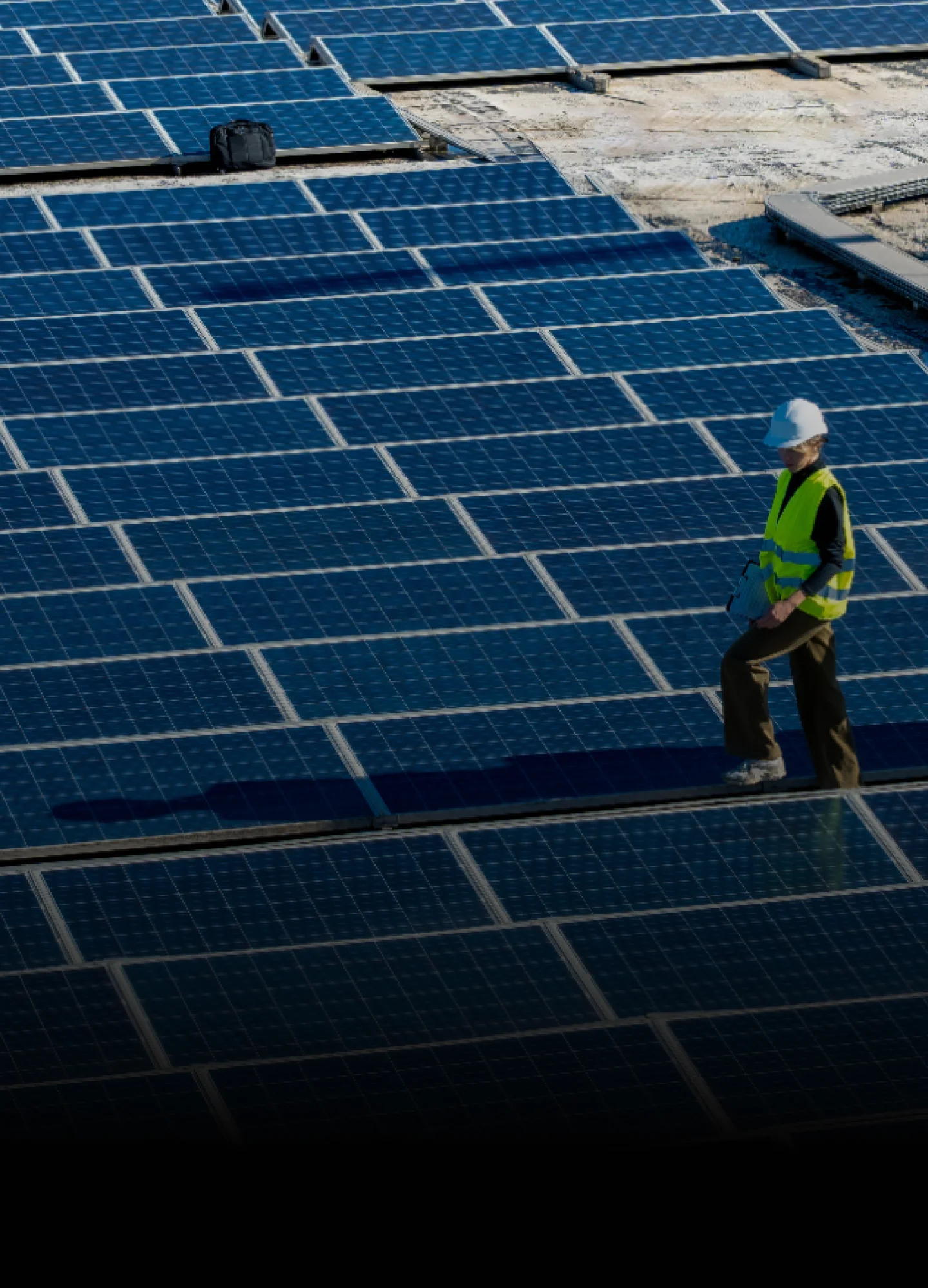 Large solar panel installation on a rooftop PV system