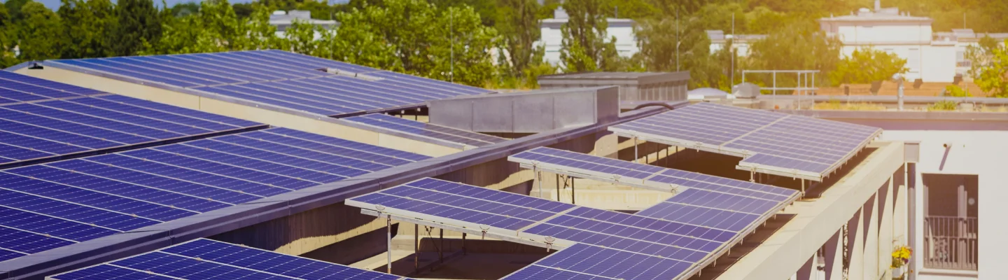 Solar panels generating power on building rooftop