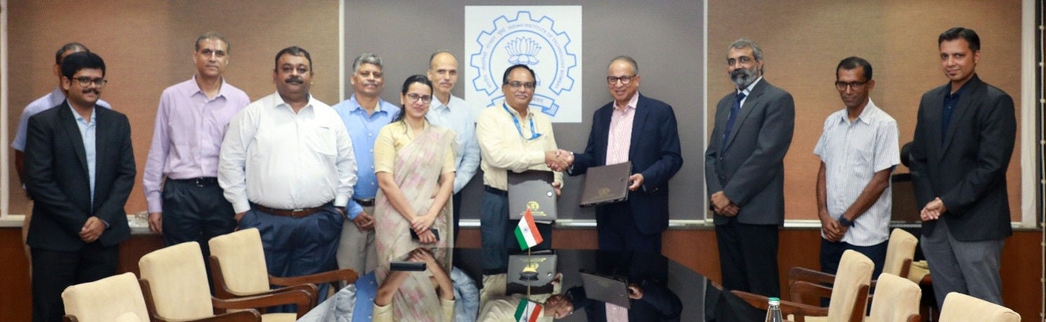 Dr. Praveer Sinha, CEO & MD, Tata Power (fourth from left) and Prof. Shireesh Kedare, Director , IIT Bombay, (fifth from left ) exchange the signed Master Research Agreement formalizing a strategic partnership to advance research, innovation, and commercialization of clean energy technologies