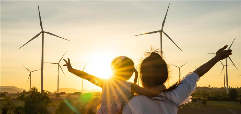 Wind turbines representing clean energy and future-ready sustainable power system