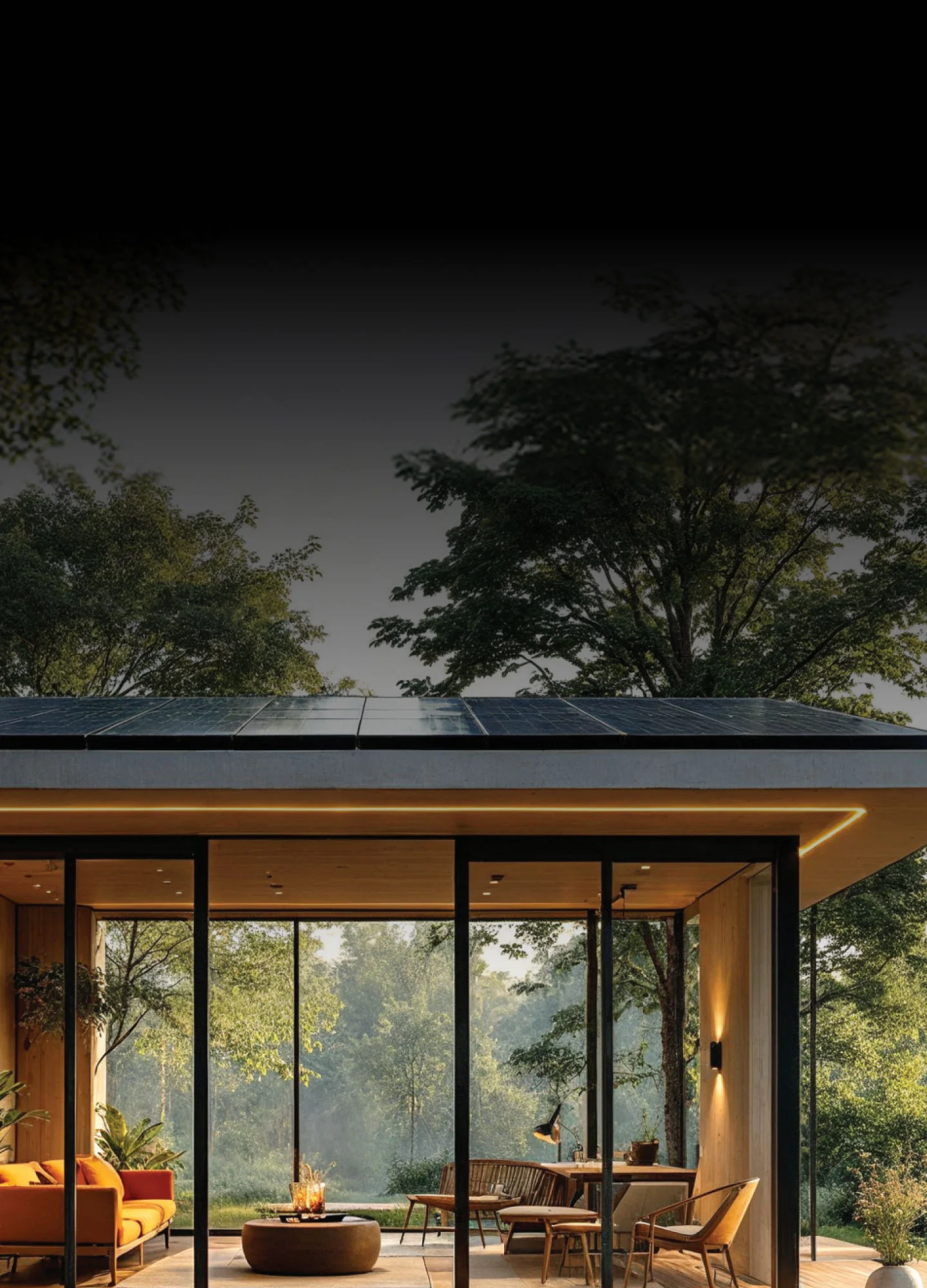 Solar-powered house with panels on the roof and trees around