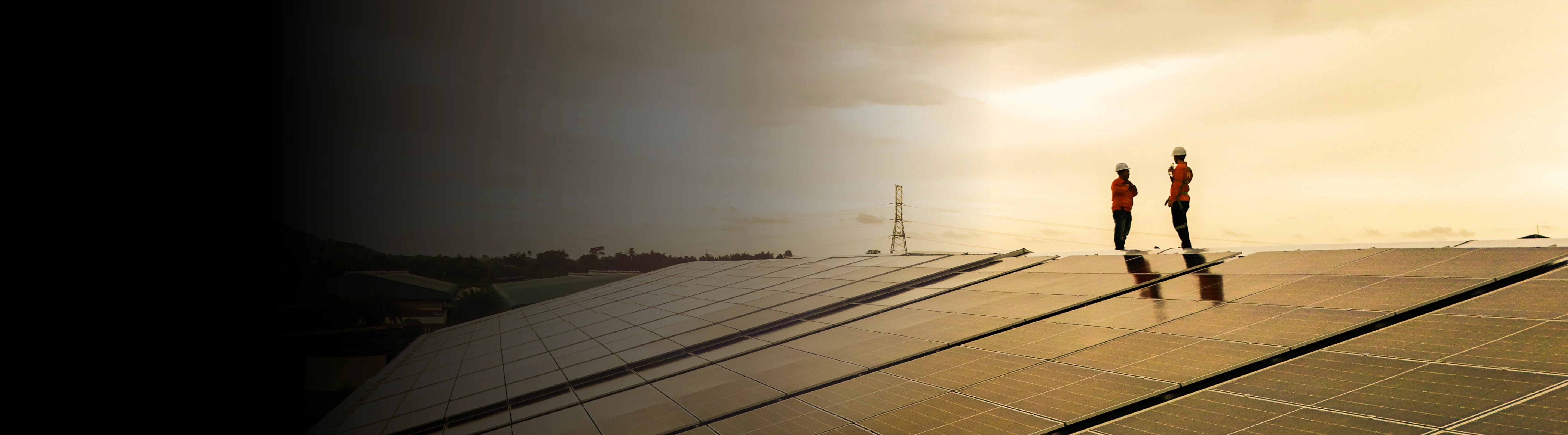 Technicians maintaining a solar microgrid for sustainable rural electrification