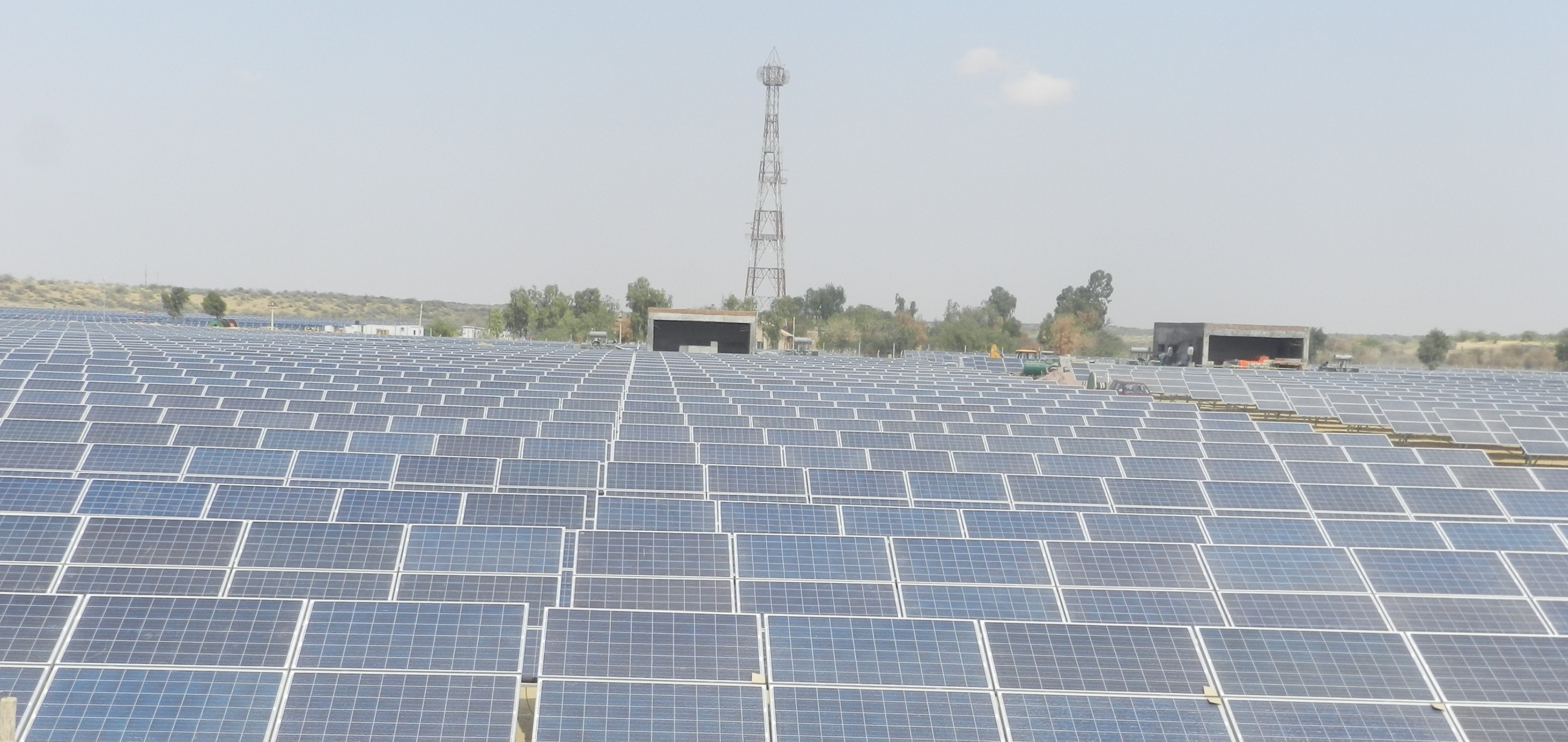 Solar energy microgrid generating electricity from a large field of panels